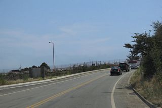 Eastbound Bunker Road leaves the Baker-Berry Tunnel ahead of Alexander Avenue.