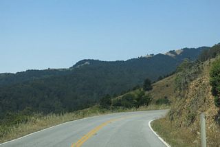 Often congested, Panoramic Highway descends toward Redwood Creek, where the namesake redwoods reside.