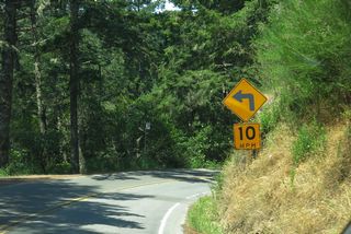 Nearing the bottom of the hill is this fairly sharp curve, followed by the entrance to the national monument