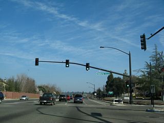 Traveling northeast on Folsom Boulevard is this interchange with Sutter Street just west of downtown Folsom after the Natoma Street intersection. Natoma Street east leads to the Folsom Lake Crossing near Folsom Dam.