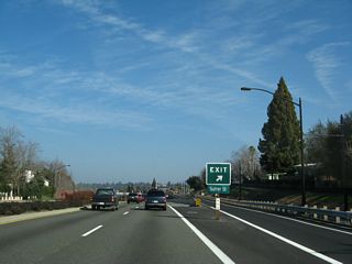 Traveling northeast on Folsom Boulevard is this interchange with Sutter Street just west of downtown Folsom after the Natoma Street intersection. Natoma Street east leads to the Folsom Lake Crossing near Folsom Dam.