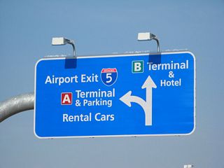 Leaving Sacramento International Airport - Terminal A ahead of the short expressway spur leading to Interstate 5.