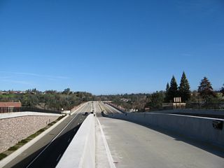 This view look north from the Sutter Street overpass toward the Folsom Boulevard bridge over the American River. The interchange facilities through traffic on Folsom Boulevard while allowing easy access to downtown Folsom.