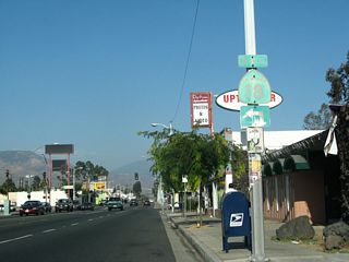SR 18 Business north separated from SR 30 Business (Highland Avenue) east at Sierra Way, the succeeding traffic light beyond Mountain View Avenue.