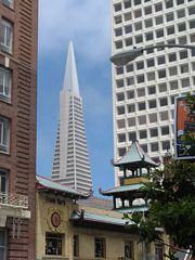 Near the Grant Street intersection, the TransAmerica Pyramid building comes into view. This unique structure helps identify San Francisco' skyline. It is located at the intersection of Columbus Avenue and Washington Street.