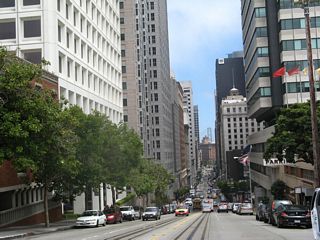 After the Grant Street traffic signal, California Street continues east into the Financial District. Grant Street north leads into Chinatown.