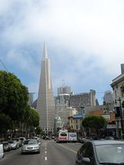 Traveling southeast on Columbus Avenue, the four-lane arterial connects Fisherman's Wharf with the downtown financial district via North Beach. The wide boulevard travels directly to the TransAmerica Pyramid, which dominates the financial district skyline as seen from the Broadway/Grant Street intersection.