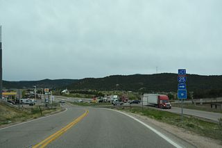 A roundabout replaced the intersection along Santa Fe Trail (CR 69.3) with the access road across Interstate 25 to CR 69.1.