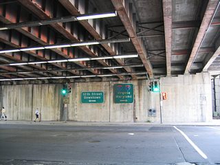 L'Enfant Promenade ends at D Street SW. D Street heads west to intersect 12th Street SW at Maryland Avenue SW, south of the 12th Street Expressway tunnel under the National Mall.