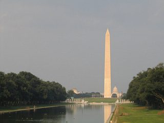 Facing east from the Lincoln Memorial Circle SW, in view is the Constitution Gardens, the Reflecting Pool, Washington Monument, and the U.S. Capitol dome.