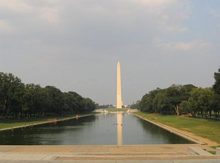 Facing east from the Lincoln Memorial Circle SW, in view is the Constitution Gardens, the Reflecting Pool, Washington Monument, and the U.S. Capitol dome.