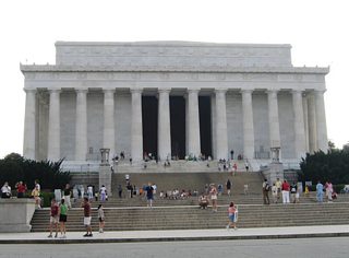Walking along the Lincoln Memorial Circle SW between Daniel French and Henry Bacon Drives. The roadway encircles Lincoln Memorial, with the eastern half closed to vehicular traffic.