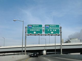 The northbound ramp to Interstate 395 splits with ramps to the Center Leg Freeway north to U.S. 50 (New York Avenue) and D Street SW near the Rayburn Building.