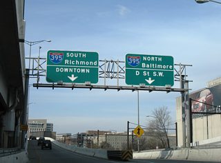 Turning west, drivers partition into the ramps for Interstate 395 north to U.S. 50 (New York Avenue) and Interstate 395 south to Arlington, Virginia.