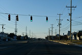 Bay Vista Road (Rd 273A) north intersects SR 1 (Coastal Highway) across from access to parallel Oyster House Road (Rd 273C).