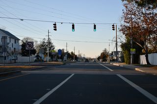 SR 1 (Coastal Highway) angles northwest from Dewey Beach along a 1940s-bypass of Rehoboth Beach. SR 1 leaves the town limits north at Bayard Avenue.