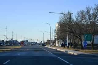 SR 1A (Rehoboth Avenue Extension) converges with SR 1 (Coastal Highway) adjacent to a service road connecting with Hebron Road (Rd 273) north.