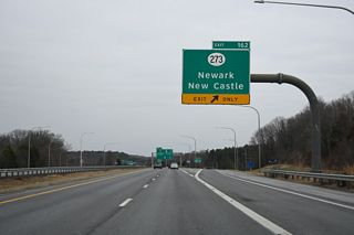 Exit 162 departs SR 1 north for SR 273 (Christiana Road) to Christiana and Hares Corner. Future construction will address congestion at this exchange.