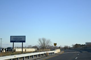 SR 1 spans Lewes Georgetown Trail at the unincorporated community of Nassau. Commercial development associated with the Delaware Beaches follows at Belltown, Five Points and Midway.
