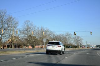 Tulip Drive loops north from this traffic light on SR 1 by the Taramino and Covered Bridge Trails neighborhoods.