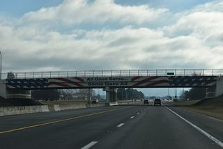 The Old Lebanon Road overpass was repainted in 2023 with a patriotic theme.