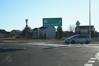 SR 23 (Beaver Dam Road) heads southwest from SR 1D at Belltown to Hollymount and southeast to Massey Landing along Indian River Bay.