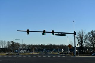 Warrington Road (Rd 275) extends south from SR 1D (Plantation Road) and SR 24 (John J. Williams Highway) to Old Landing Road (Rd 274) and the Breezewood community.