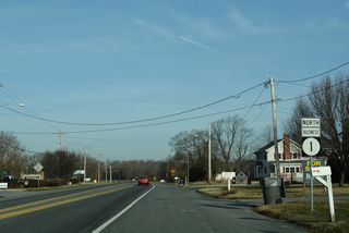 Continuing north, SR 1 Business (Rehoboth Boulevard) travels through an area of wetlands ahead of the Mispillion River.