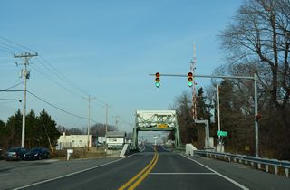 SR 1 Business (Rehoboth Boulevard) crosses the Mispillion River along a bascule bridge. The Mispillion doubles as the border between Kent and Sussex Counties east from Greenwood to Delaware Bay.