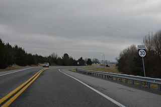 SR 30 commences along SR 1 Business south at the wye interchange joining SR 1 northbound with Rehoboth Boulevard.
