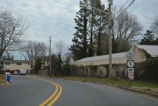 Roosevelt Street runs alongside SR 1 (Coastal Highway) east to Washington Street and the Rehoboth Manor community.