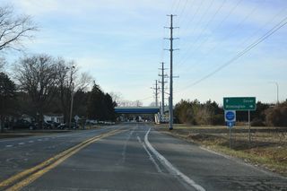 SR 1 (Korean War Veterans Memorial Highway) wraps around the east side of Dover from Dover Air Force Base north to Dover Downs.
