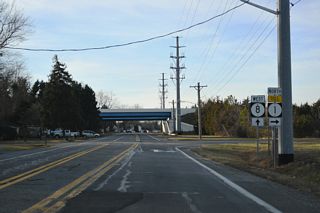 Motorists taking SR 1 north next enter the Dover main line toll plaza. The toll road continues ten miles north to south Smyrna.