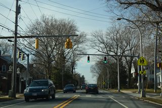 A traffic light operates at Kings Highway NE and Kent Avenue for the adjacent Central Middle School.