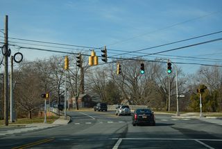Kings Highway NE south and Park Dive north converge with SR 8 at the St. Jones River. Kings Highway NE overtakes Division Street as the name for SR 8 west over the next 0.25 miles.