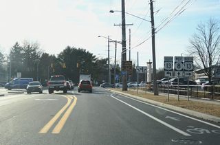 U.S. 13 constitutes a six lane commercial arterial north to Dover Downs and Delaware State University and south to the adjacent split with Bay Road (old U.S. 113) for Dover Air Force Base.