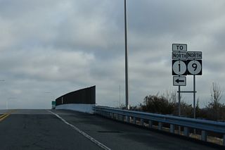 Delaware State Route 9 begins north at a diamond interchange (Exit 91) with SR 1 adjacent to Dover Air Force Base.