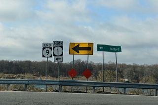 An end shield for SR 9 stands beside the southbound entrance ramp for SR 1 to Frederica, Milford and Rehoboth Beach.