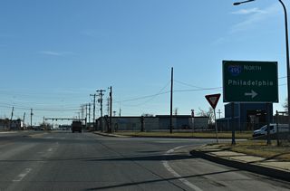 I-495 elevates northward from SR 9A across the Christina River to Cherry Island in Wilmington and Edgemoor.