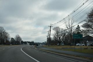 Lebanon Road curves northeast past Lebanon on the 1.73 miles leading to Bay Road (Rd 7) at the North Gate of Dover Air Force Base (DAFB).
