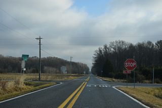 SR 10 Alt (Henry Cowgill Road) straightens out ahead of the four way stop at Berrytown Road (Rd 246).