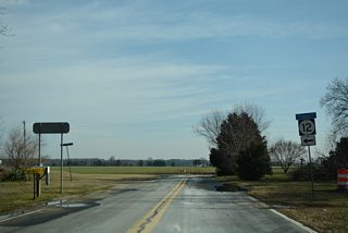 Two State Road splits with Whiteleysburg Road just ahead of the Delaware state line. The older alignment is still posted as SR 12 where it intersects Burnite Mill Road.