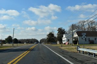 Fox Hunters Road (Rd 455) heads 2.93 miles south from Whiteleysburg Road to SR 14 at Vernon ahead of this west reassurance marker.