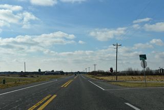 Hemping Road (Rd 299) and Cornish Road (Rd 300) meet SR 14 at succeeding intersections from the north.