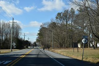 Reassurance marker for SR 14 posted west of the stop sign at Deep Grass Lane south and Killens Pond Road north.