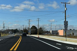 SR 14 intersects U.S. 13 (Dupont Highway) just inside Harrington by Harrington Midway Park Center retail plaza.