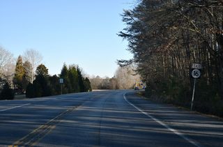 SR 16 (Milton Ellendale Highway) curves southeast from Hummingbird Road (Rd 227) southeast beyond Ellendale.