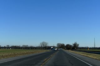SR 16 (Milton Ellendale Highway) diverges from the Delaware Coast Line Railroad east at Saw Mill Road (Rd 238).