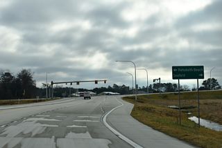SR 20 branches west from U.S. 113 (Dupont Boulevard) and SR 24 at a parclo B2 interchange with the North Millsboro Bypass. Leading SR 24 east past Millsboro, the bypass opened to traffic on September 26, 2025.