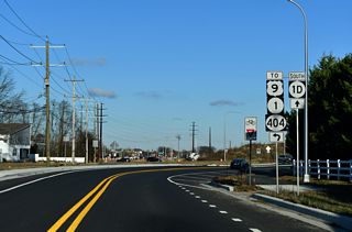SR 1D/23 combine along Belltown Road north to an adjacent intersection with U.S. 9/SR 404 (Lewes Georgetown Highway).